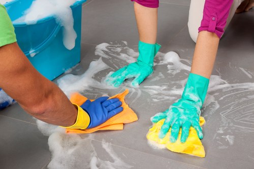 Local cleaners preparing a modern Canary Wharf flat for a deep clean