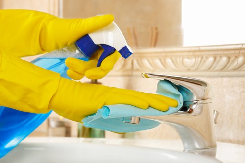 Oven cleaning team member reviewing ethical labour compliance standards