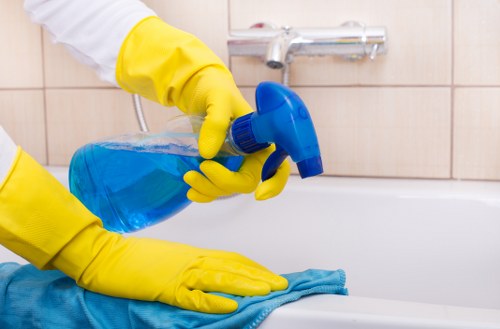 Technician completing a safety review during an oven cleaning visit